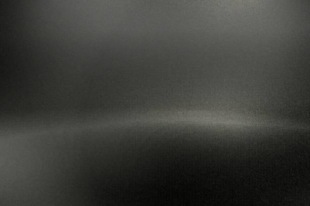istock Brushed black metal wall with scratched surface, abstract texture background 1172202778
