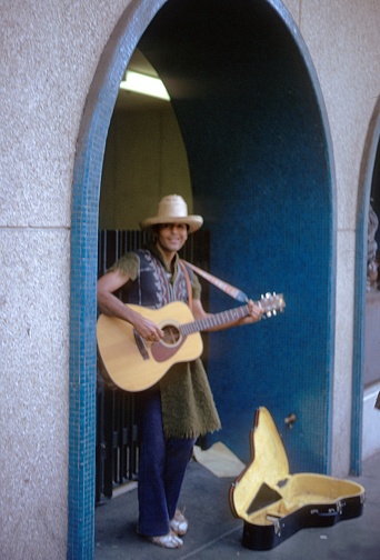 San Francisco, California, USA, 1974. Street musician with guitar in San Francisco.