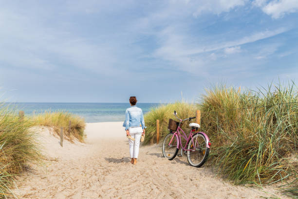 Bikes at the Beach Bikes at the Beach baltic sea people stock pictures, royalty-free photos & images