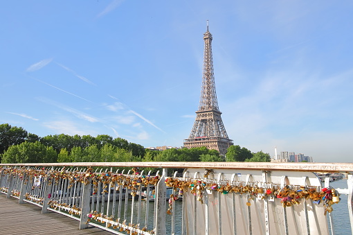 Paris France - May 23, 2019: Eiffel tower and love lock padlock cityscape Paris France