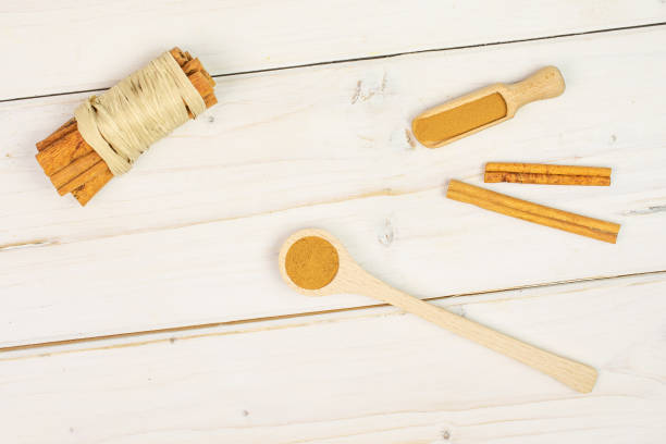 istock Dry brown cinnamon on grey wood 1172215138