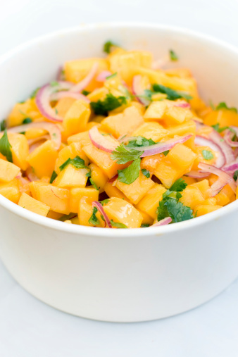 An Indian-style salad of mango, red onion and cilantro with lime juice and salt.