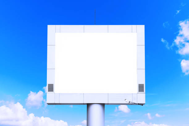istock Blank billboard mockup with white screen against clouds and blue sky background. Copy space banner for advertisement. Business Concept. 1172221188