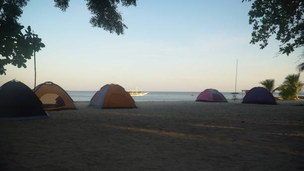 istock Tents for camping on a tropical beach 1172221887