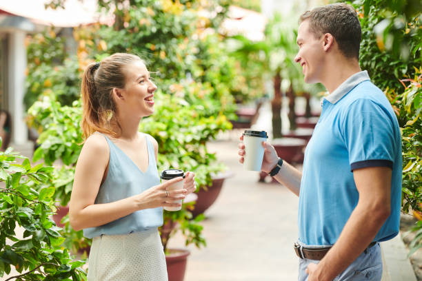 istock Talking young man and woman 1172225493
