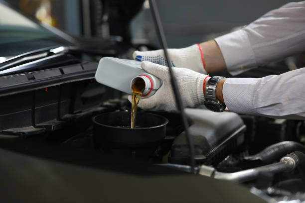 istock Male hand in white protective gloves with funnel 1172225684
