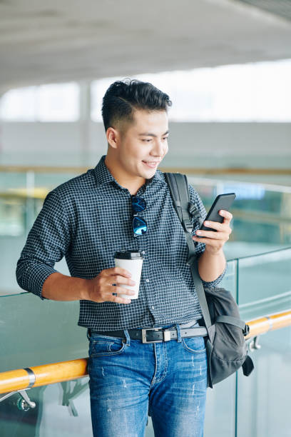 istock Man standing in airport terminal 1172226096