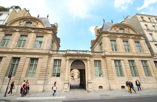 Paris France - May 23, 2019: People visit Hotel de Sully historical building Paris France