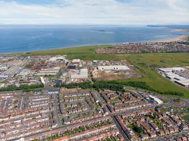 Aerial photo of the UK town of Hartlepool in County Durham, England showing rows of houses, roads and the ocean in the background. Aerial photo of the UK town of Hartlepool in County Durham, England showing rows of houses, roads and the ocean in the background. hartlepool photos stock pictures, royalty-free photos & images