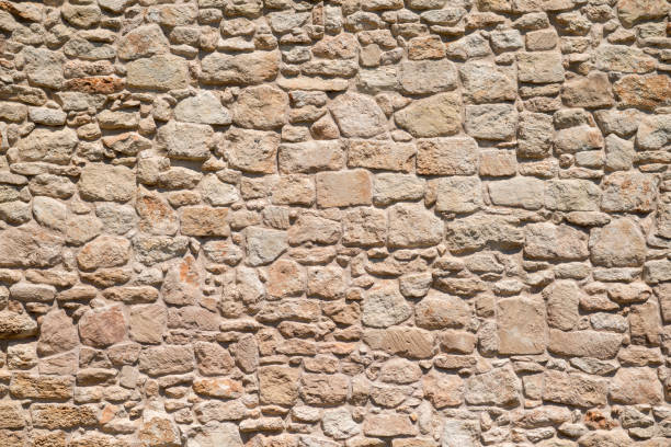 antique stone wall in italy - stone textured italian culture textured effect imagens e fotografias de stock