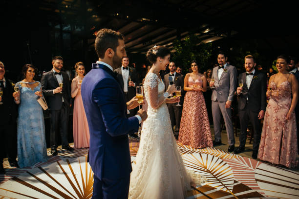 istock Bride and groom talking on wedding party 1172231662