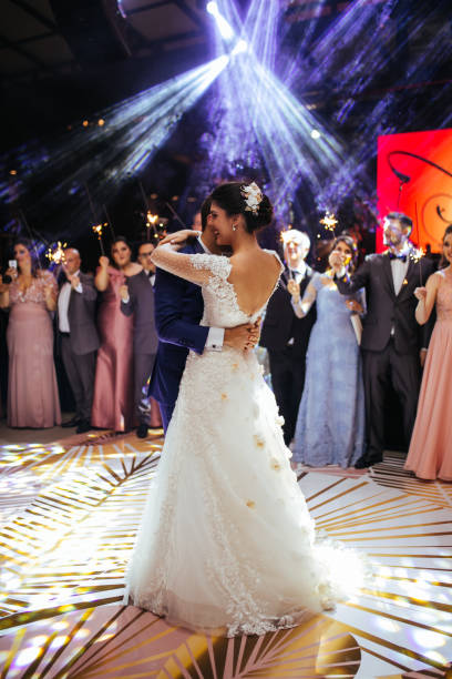 istock Bride and groom dancing their first dance 1172231669