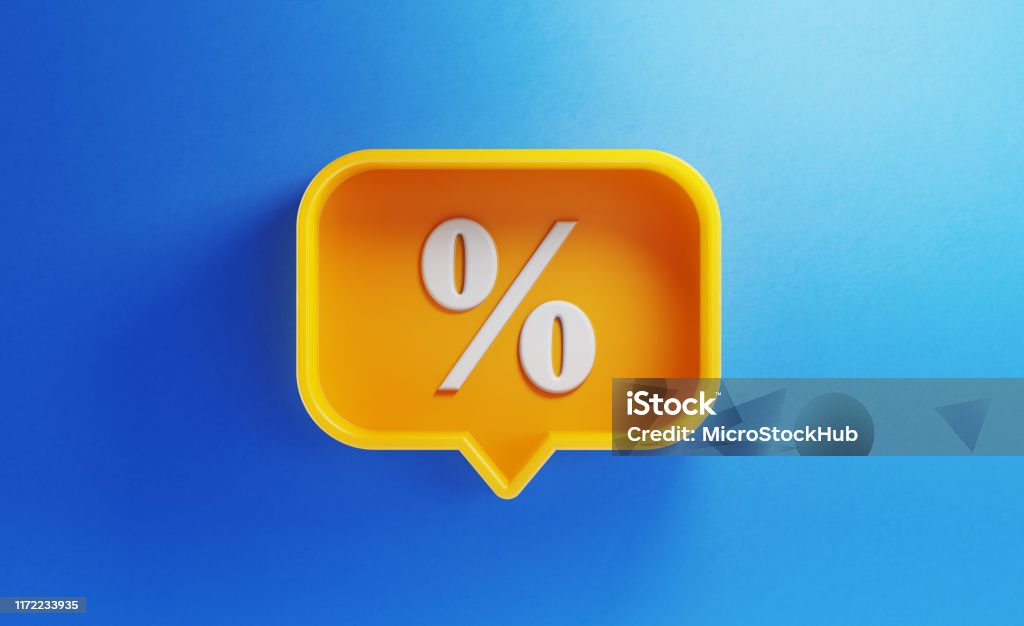 Speech Bubble Shaped Yellow Button with Percentage Sign on Blue Background Speech bubble shaped yellow button with percentage sign on blue background. Horizontal composition with copy space. Sale concept. Sale Stock Photo