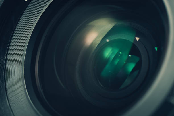 istock Close up beautiful camera lens with color reflection  background. 1172238377
