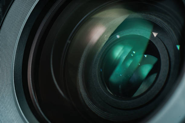 istock Close up beautiful camera lens with color reflection  background. 1172238461