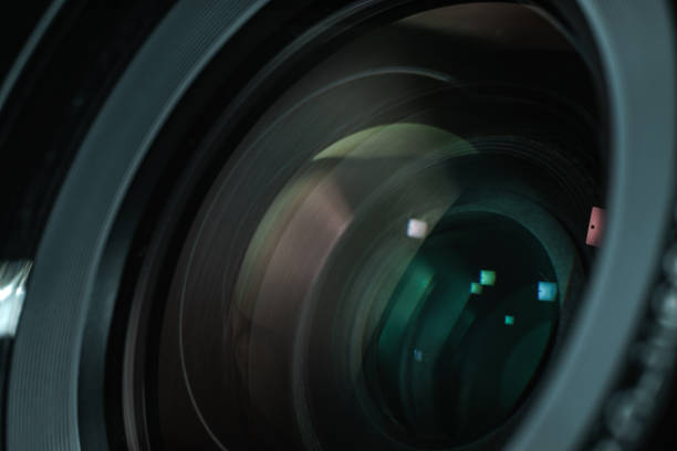 istock Close up beautiful camera lens with color reflection  background. 1172239224