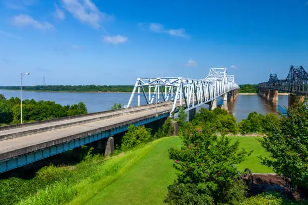 The Old Vicksburg Bridge is a cantilever bridge carrying one rail line; and the new Vicksburg Bridge is a cantilever bridge which is Interstate 20 and U.S. Route 80, both cross the Mississippi River between Delta, Louisiana and Vicksburg