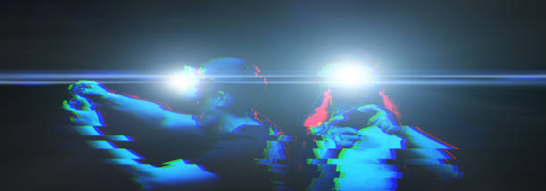 istock Couple with virtual reality headset are playing game. Image with glitch effect. 1172240112