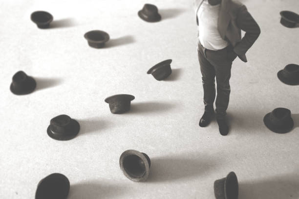 istock surreal man has lost his black bowler among many others; abstract identity concept 1172240401