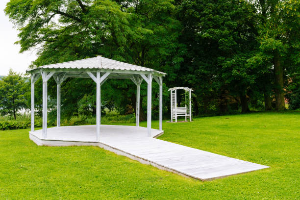 istock white wedding gazebo in the old park 1172240545