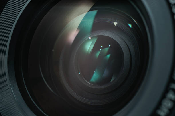 istock Close up beautiful camera lens with color reflection  background. 1172241332