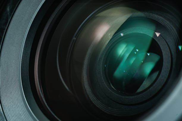 istock Close up beautiful camera lens with color reflection  background. 1172241360