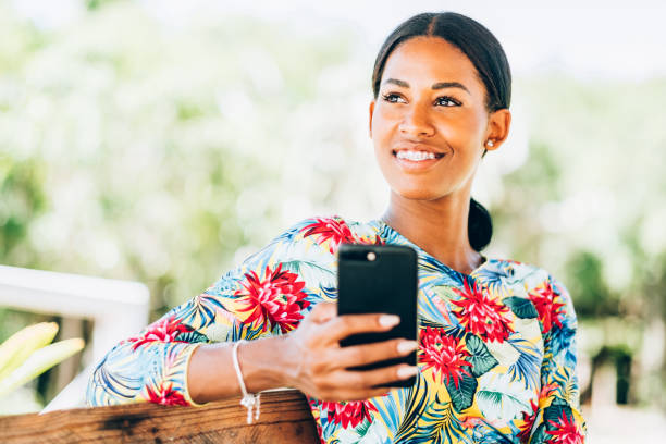 istock Young Black woman at resort cabana 1172245922