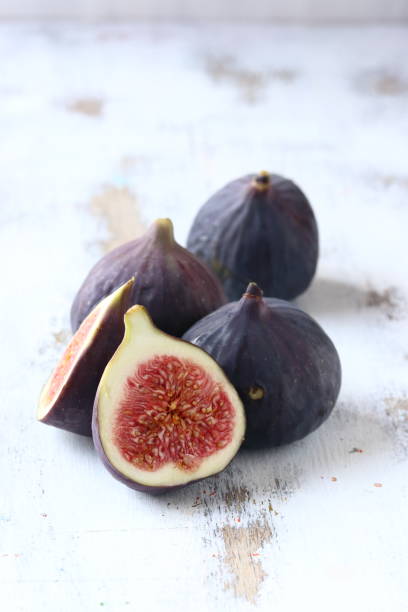 istock Fig fruit on a white wooden background 1172246411