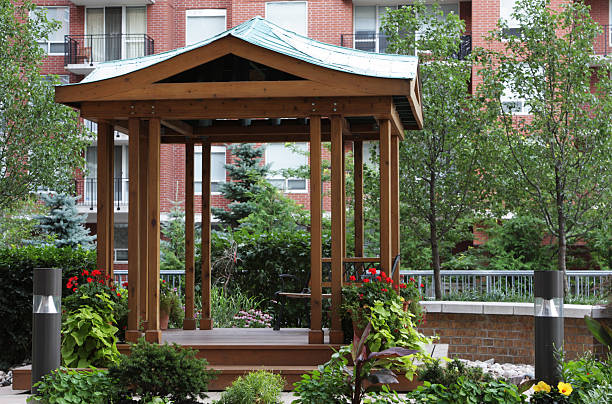 istock Empty Gazebo with trees and flowers around it 117224662