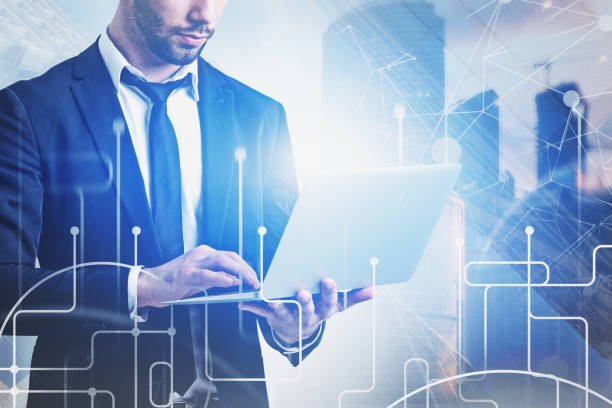 istock Man with laptop in city, global network 1172249543