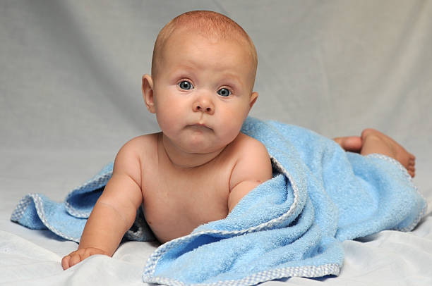 Baby after bath stock photo