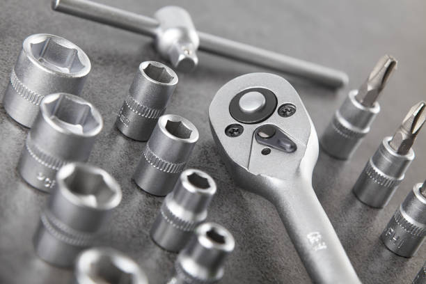 istock ratchet set with heads, different socket wrenches close-up on a dark stone background 1172250424