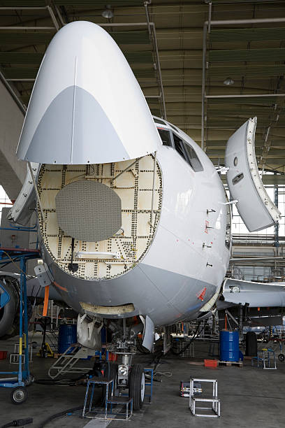 istock Commercial Airplane Maintenance Check in Hangar 117225145
