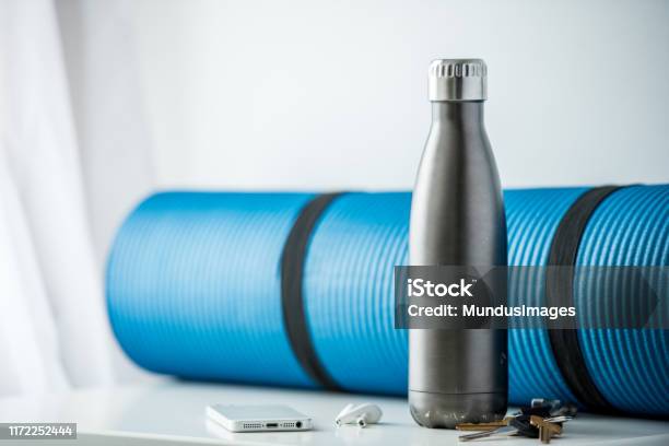 About To Head To The Gym And Exercise Stock Photo - Download Image Now - Water Bottle, Exercise Mat, Gym