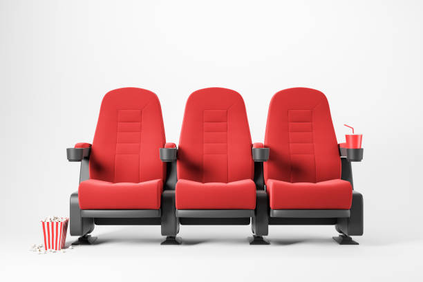 istock Three red cinema chairs on white background 1172252883