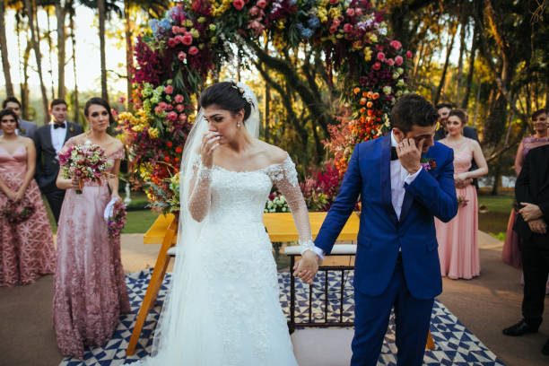 bride and groom crying in the altar - wedding behavior horizontal men imagens e fotografias de stock