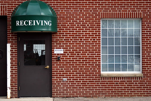 istock Receiving door and a brick wall in Urban setting Background 117225487