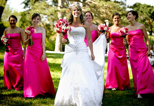 istock Pink Bride and Bridesmaids Happy Wedding Walking 117225508