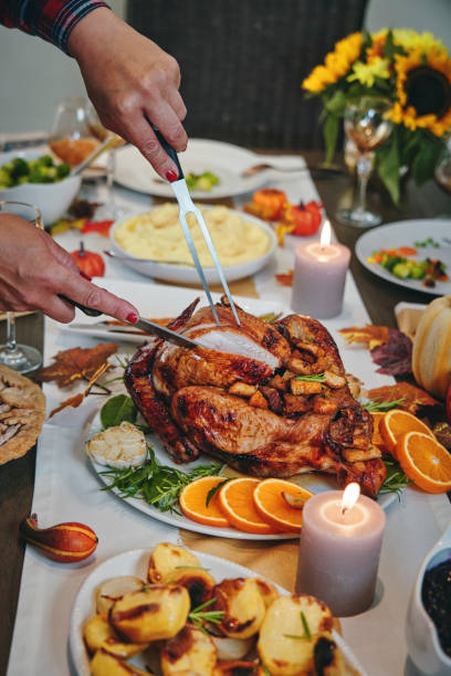 istock Family Having Traditional Holiday Stuffed Turkey Dinner 1172259788