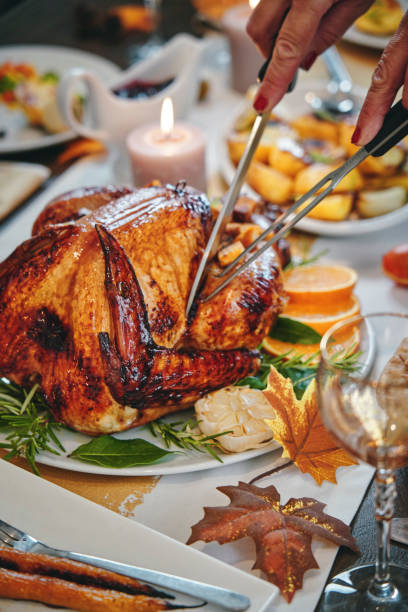 istock Family Having Traditional Holiday Stuffed Turkey Dinner 1172259792
