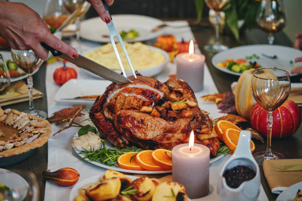 istock Family Having Traditional Holiday Stuffed Turkey Dinner 1172259793