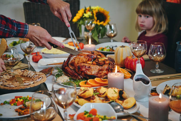 istock Family Having Traditional Holiday Stuffed Turkey Dinner 1172259800