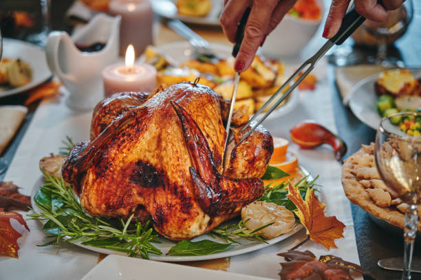 istock Family Having Traditional Holiday Stuffed Turkey Dinner 1172259931