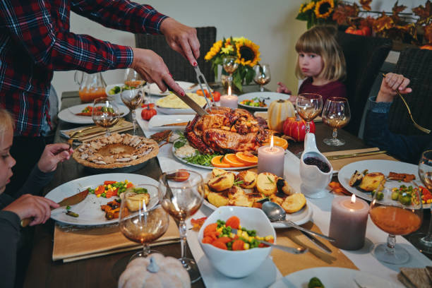 istock Family Having Traditional Holiday Stuffed Turkey Dinner 1172259951