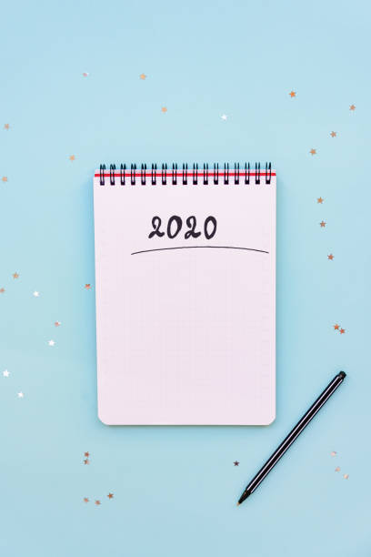 istock Top view of empty notebook ready for New 2020 Year planing or wish list 1172260521