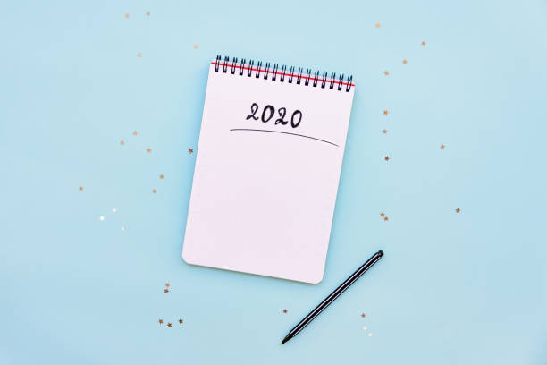 istock Top view of empty notebook ready for New 2020 Year planing or wish list 1172260543