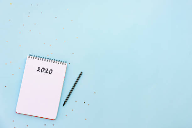 istock Top view of empty notebook ready for New 2020 Year planing or wish list 1172260571