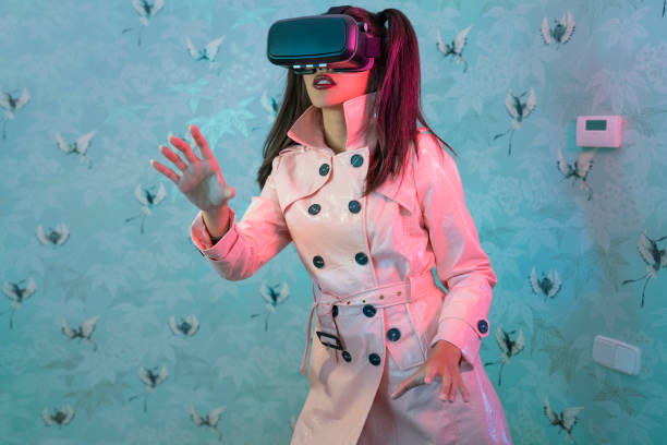 VR glasses headset young woman moving hands in house indoor