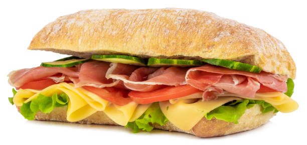 istock Ciabatta sandwich with lettuce, tomatoes prosciutto and cheese isolated on white background 1172265801