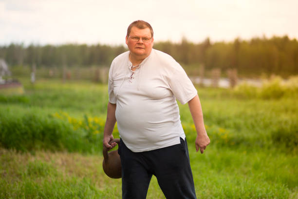 istock The fat man is engaged 1172267805